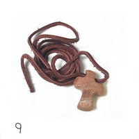 Handcarved Rock Cross with Leather Cord (Assorted Colors)
